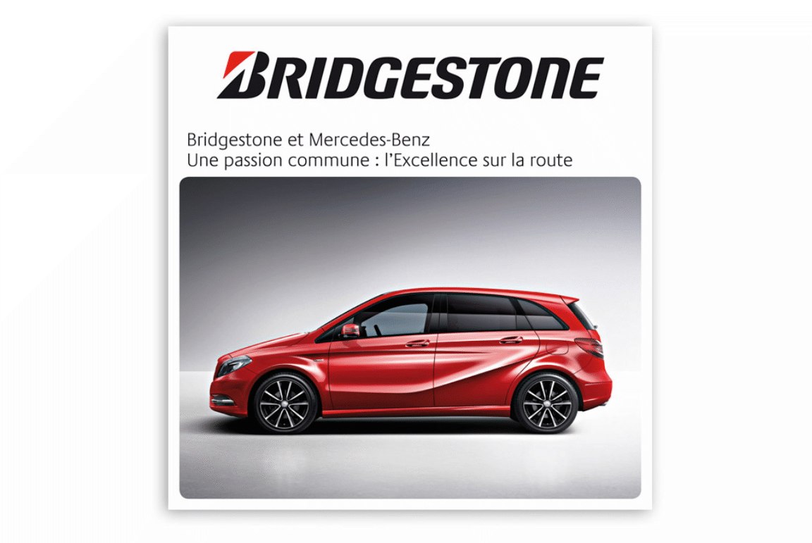 Couverture du support Bridgestone × Mercedes-Benz, une berline rouge en pleine page